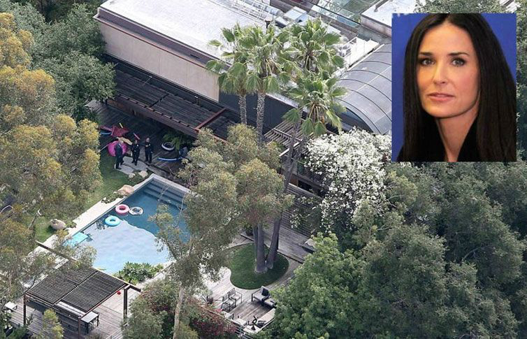 Hallan cadáver en la piscina de Demi Moore