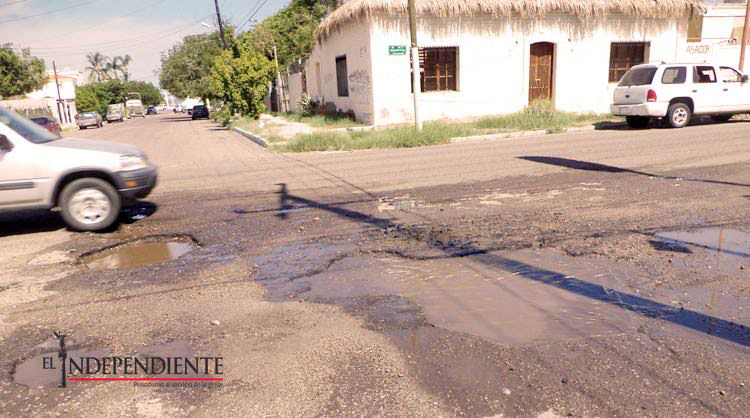 “Los baches el problema nuestro de cada día” dicen ciudadanos y conductores de peseras