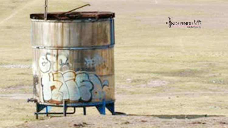 Hallan tambos con restos humanos en Puebla